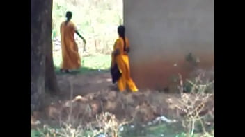 Pissing behind her house 1...