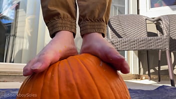 Boy Bare Feet Smashes Pumpkin And Plays With It...